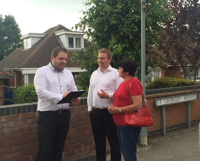 Local resident Lloyd Godsall signing the streetlighting petition