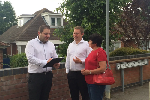 Local resident Lloyd Godsall signing the streetlighting petition