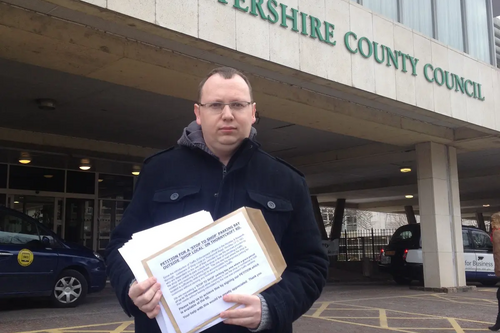 Cllr Stuart Bray at County Hall with the petition