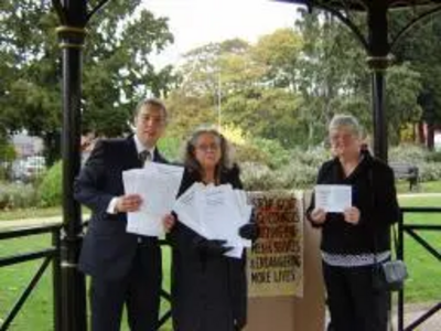 Michael Mullaney, and Denise Wood and Janet Rowe from  the Pensioners Action Group with the petitions.