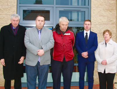 Barwell campaigners Michael Gould, Mathew Hulbert, Terry Kirby, Michael Mullaney and Charlotte Green outside Barwell library