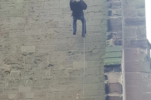 Michael Mullaney abseiling down St Mary's Church Hinckley