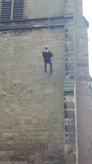 Michael Mullaney abseiling down St Mary's Church Hinckley