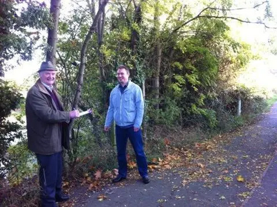 Cllrs David Bill and Michael Mullaney near the "Big Pit" in Hinckley