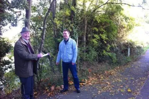 Cllrs David Bill and Michael Mullaney near the "Big Pit" in Hinckley