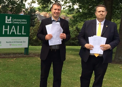 Cllrs Mathew Hulbert and Michael Mullaney with the petitions to save Barwell Library