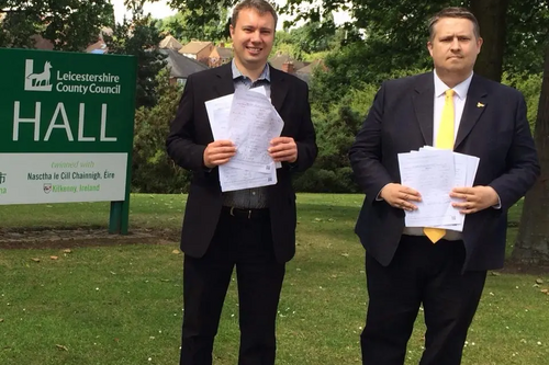 Cllrs Mathew Hulbert and Michael Mullaney with the petitions to save Barwell Library