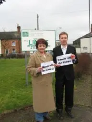 Cllr Bron Witherford and Michael Mullaney protesting outside the Limes Care Home