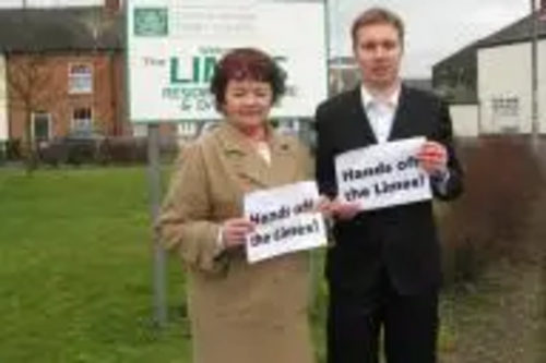 Cllr Bron Witherford and Michael Mullaney protesting outside the Limes Care Home