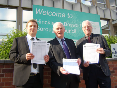 Cllrs Michael Mullaney, David Bill and Dave Cope about to submit the petitions to the Borough Council