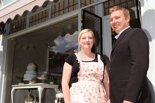 Councillor Michael Mullaney with one of Hinckley's newest shop owners Cathy Phayres of Buttercream Bakery