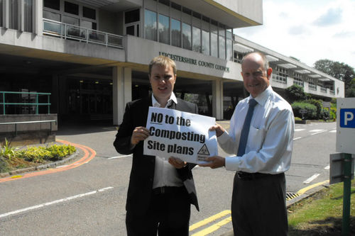 Cllrs Michael Mullaney and Bill Crooks protesting against the compost site plans outside Leicestershire County Council