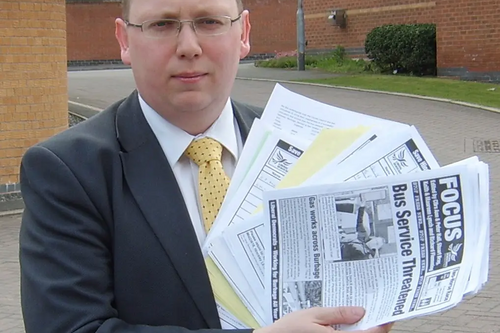 Cllr Stuart bray with some of the more than 2,000 signatures on the petition to save local bus services