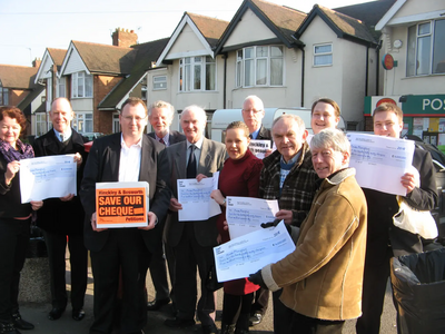 Attached; Picture of Hinckley and Bosworth Liberal Democrat councillors and campaigners with the 2,500 petitions they have collected to save the cheque.