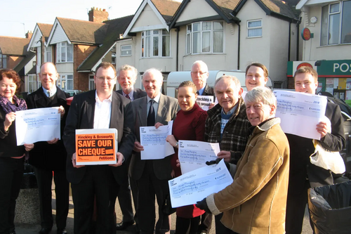 Attached; Picture of Hinckley and Bosworth Liberal Democrat councillors and campaigners with the 2,500 petitions they have collected to save the cheque.