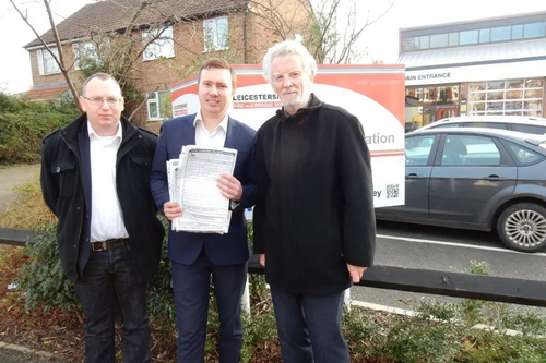 County Councillors Stuart Bray, Michael Mullaney and Keith Lynch with some of the petitions