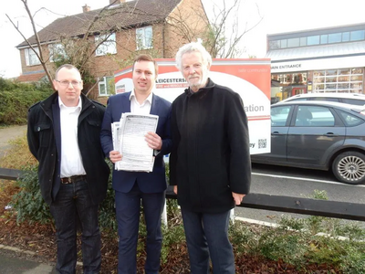 County Councillors Stuart Bray, Michael Mullaney and Keith Lynch with some of the petitions