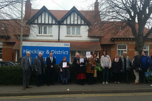 Councillors Michael Mullaney, David Bill and local residents outside Mount Road Hospital Hinckley