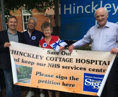 Local NHS campaigners Michael Mullaney, Dave Mayne, Lynda Gibbs and David Bill with the Hinckley NHS petitions