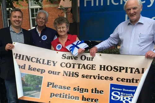 Local NHS campaigners Michael Mullaney, Dave Mayne, Lynda Gibbs and David Bill with the Hinckley NHS petitions